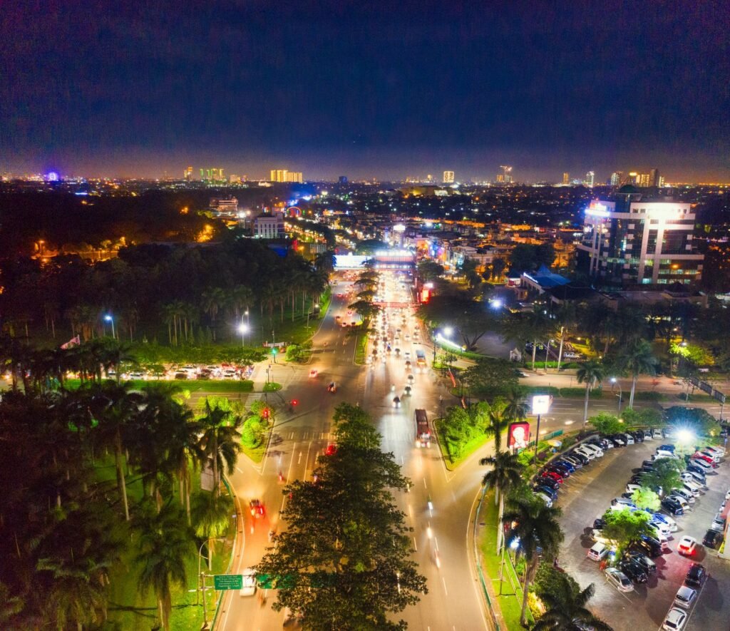 Explore the vibrant cityscape of Banten, Indonesia with this stunning aerial night view. Perfect for travel and urban themes.
