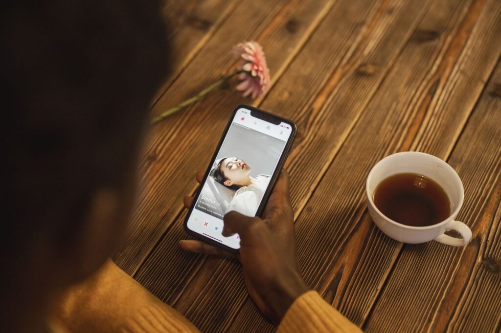 Person browsing a directory app on a smartphone
