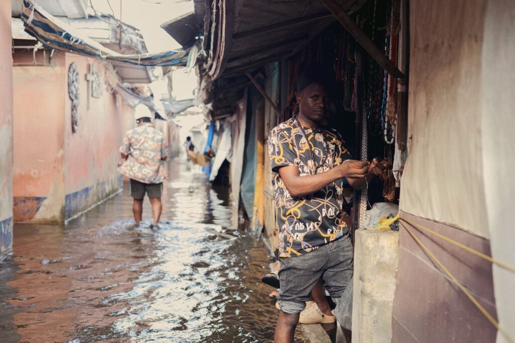 View of a flooded street market in Lekki, Lagos showcasing local life.
