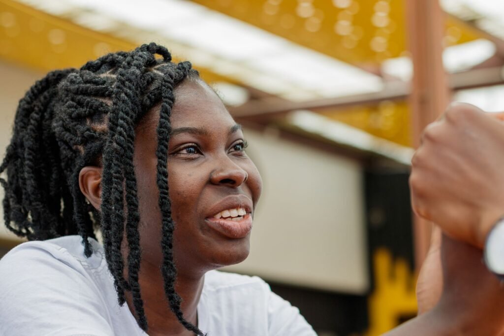 Adults discussing plans privately at a café
