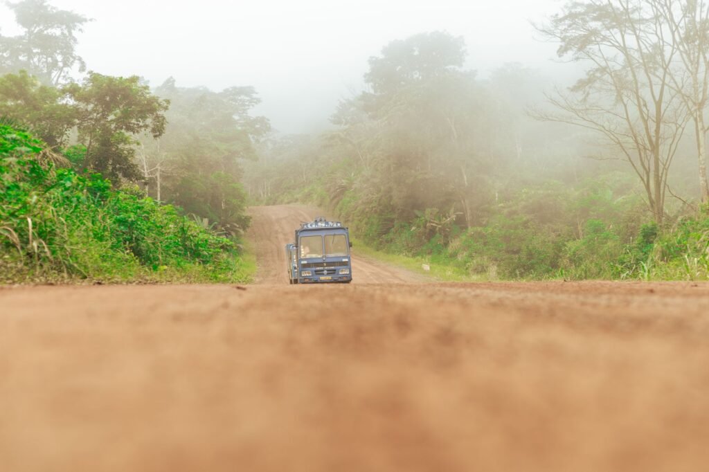 Paved road through green countryside in the Central Region