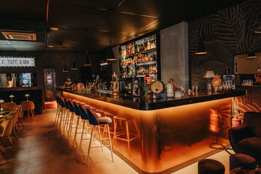 Calm bar interior in Ghana in the evening with warm lighting