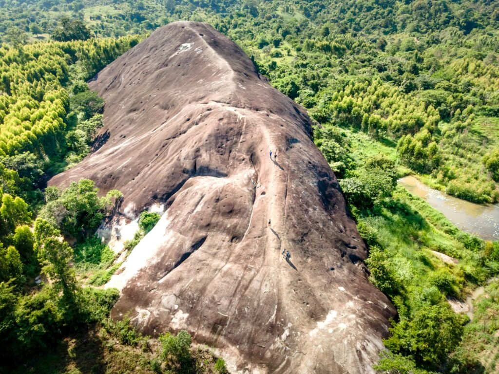 A breathtaking aerial view of Elephant Rock amidst lush greenery in Vietnam's tranquil landscape.