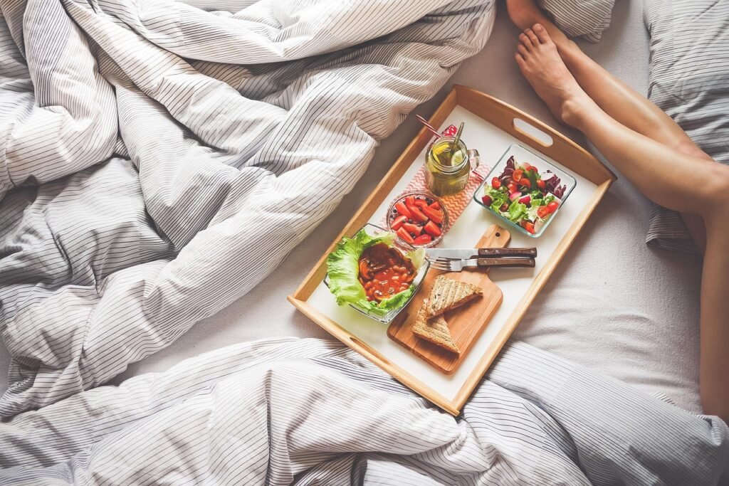 legs, breakfast, bed, breakfast in bed, tray, breakfast tray, bedroom, blanket, food, sheets, bed sheets, feet, woman, lifest