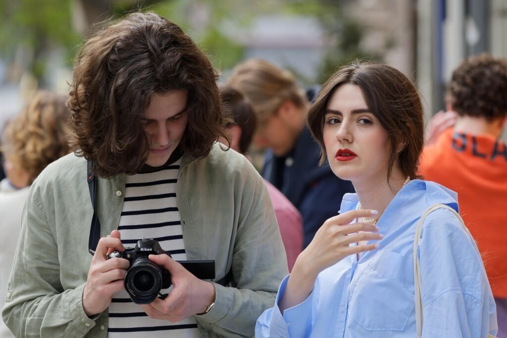 couple, recording, street, urban, outdoors, filming