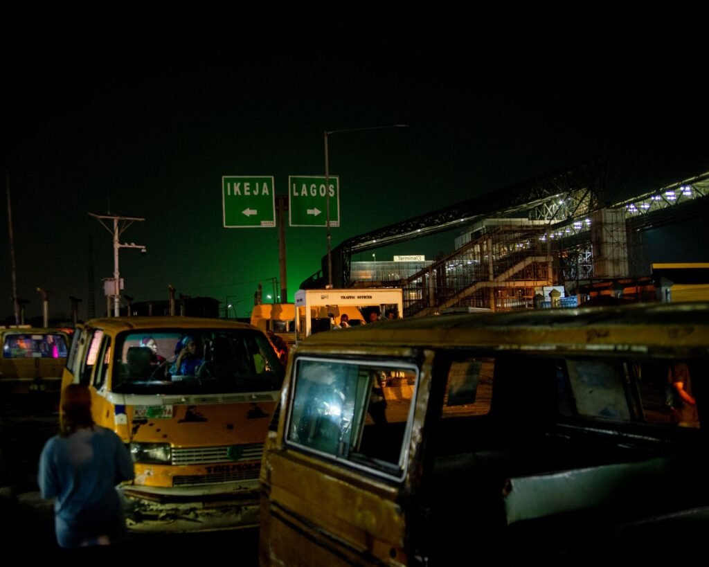Evening traffic on a city road in West Africa, illustrating travel timing around Accra