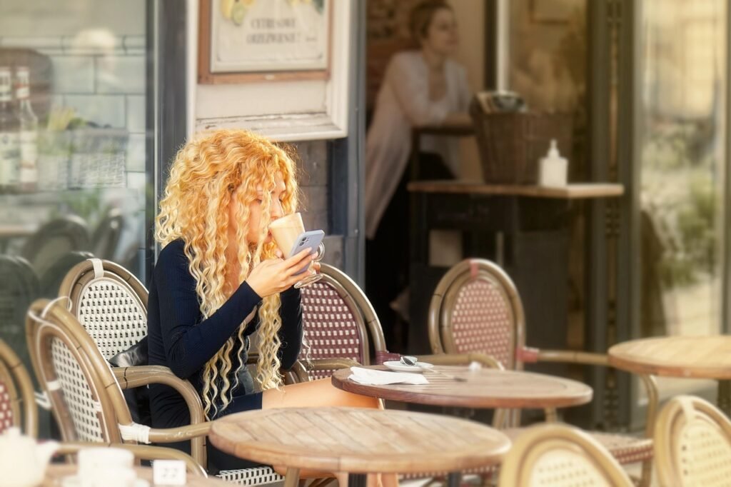 girl, cafe, outdoors, al fresco, drinking, blond, curly hair, urban, lifestyle, cafe, cafe, cafe, cafe, cafe, curly hair