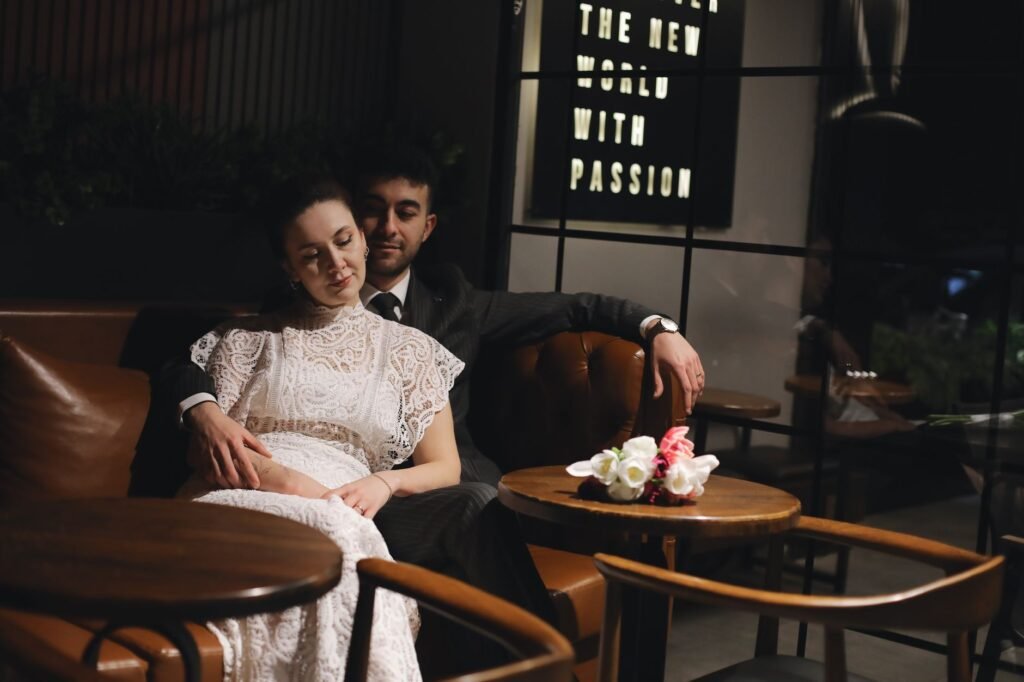 A romantic couple relaxing in a cozy cafe, enjoying a tranquil moment together.