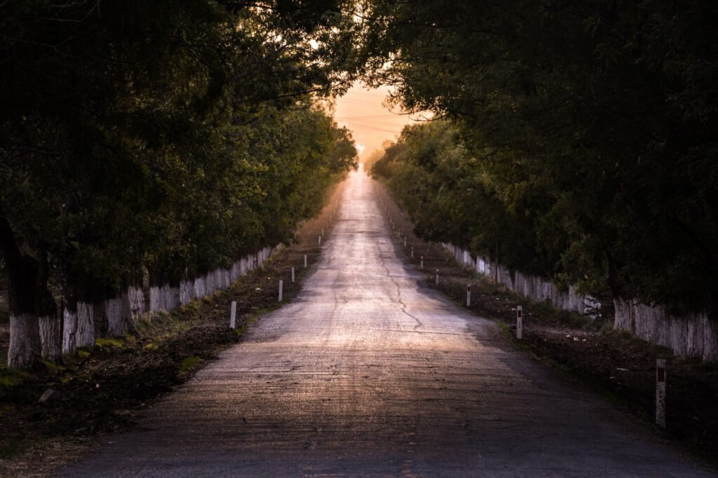 Quiet residential road at dusk in the Ashanti Region