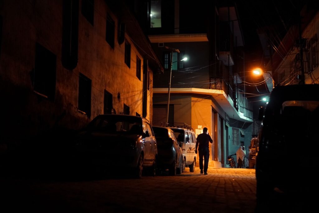 Quiet residential street in a Ghanaian town in the early evening