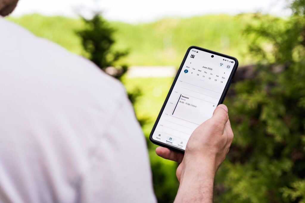 Reviewing booking details and confirmation messages on a smartphone