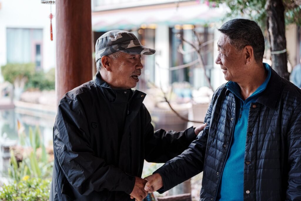 Two adults discussing meeting arrangements respectfully
