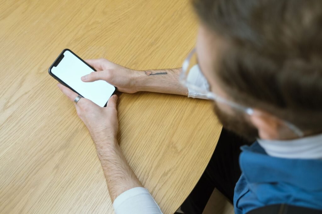 Person checking a booking confirmation on a smartphone