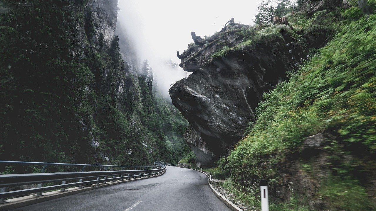 mountains, road, fog, asphalt, landscape, rocks, outdoors, travel, haze, misty, street, curved road, cliffs, nature, rural, c