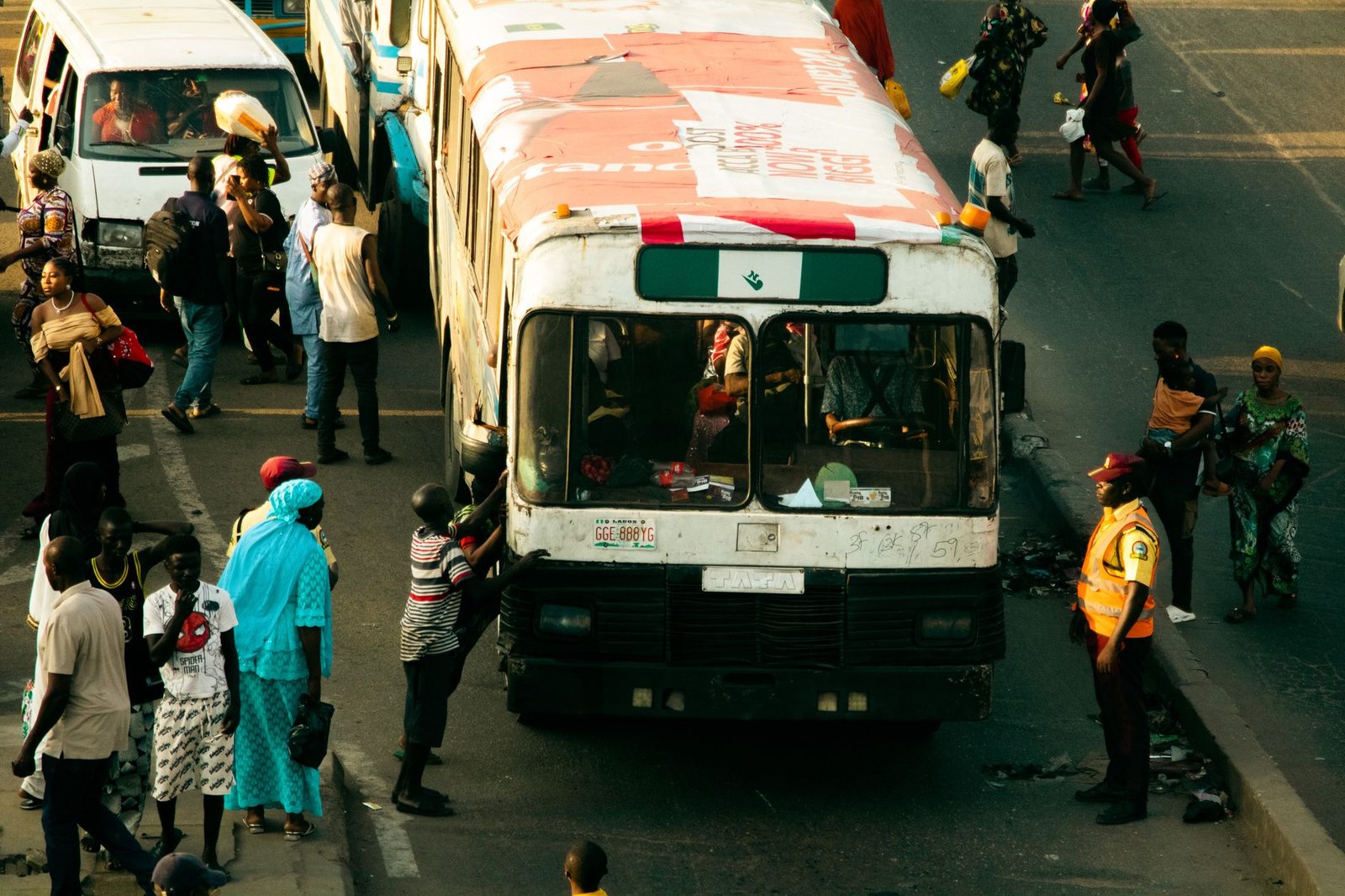 A bustling street in Lagos, Nigeria, capturing daily life and transportation activities.
