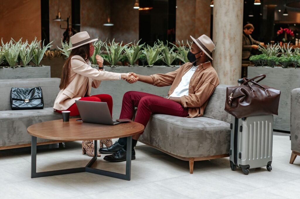 Adults discussing plans respectfully in a quiet lounge