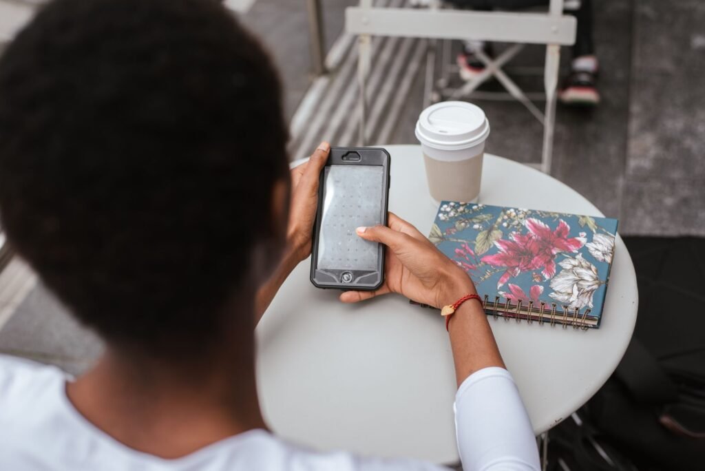Adult typing a respectful message on a smartphone