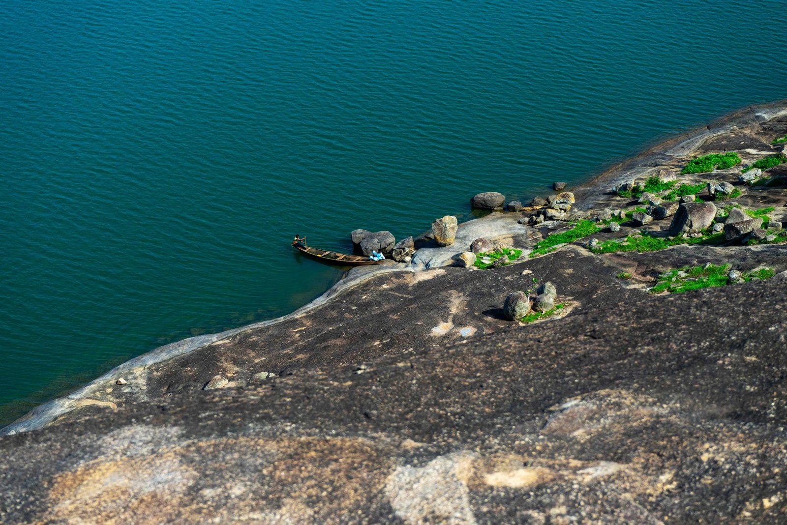 Boats moored on the shore of the Volta Lake near Kete Krachi in Oti Region, Ghana