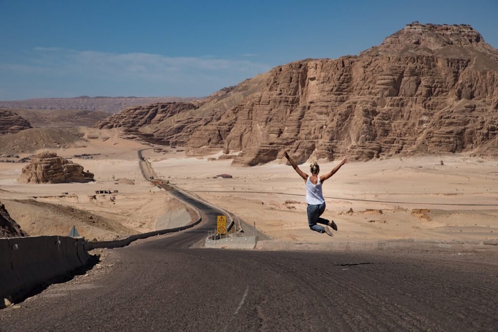 woman, jump, desert, jumping woman, road, street, badlands, barren, barren landscape, freedom, happy, joy, summer, egypt, nat