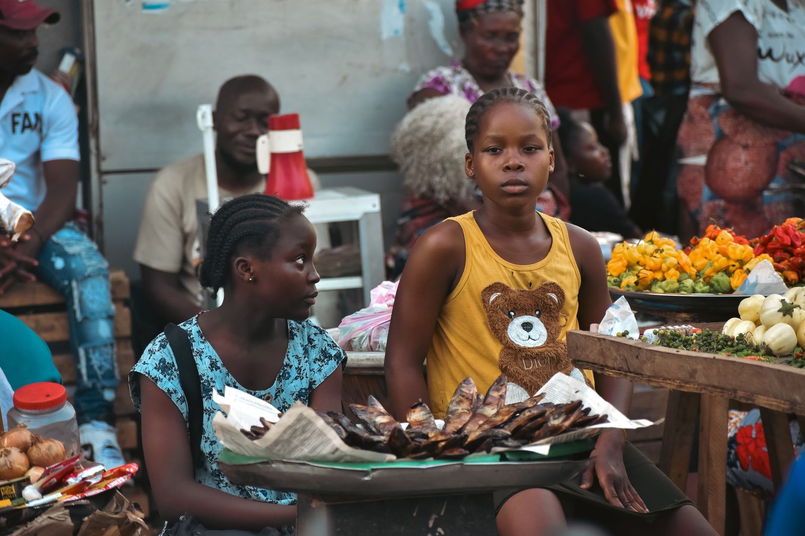 A bustling market scene in Monrovia showcasing local vendors and vibrant produce.