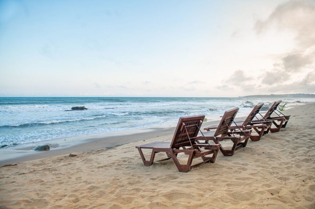 Quiet guesthouse veranda in coastal Ghana prepared for a weekend stay