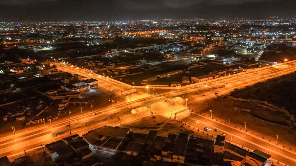 Stunning aerial view of illuminated streets in Nouakchott, Mauritania during nighttime.