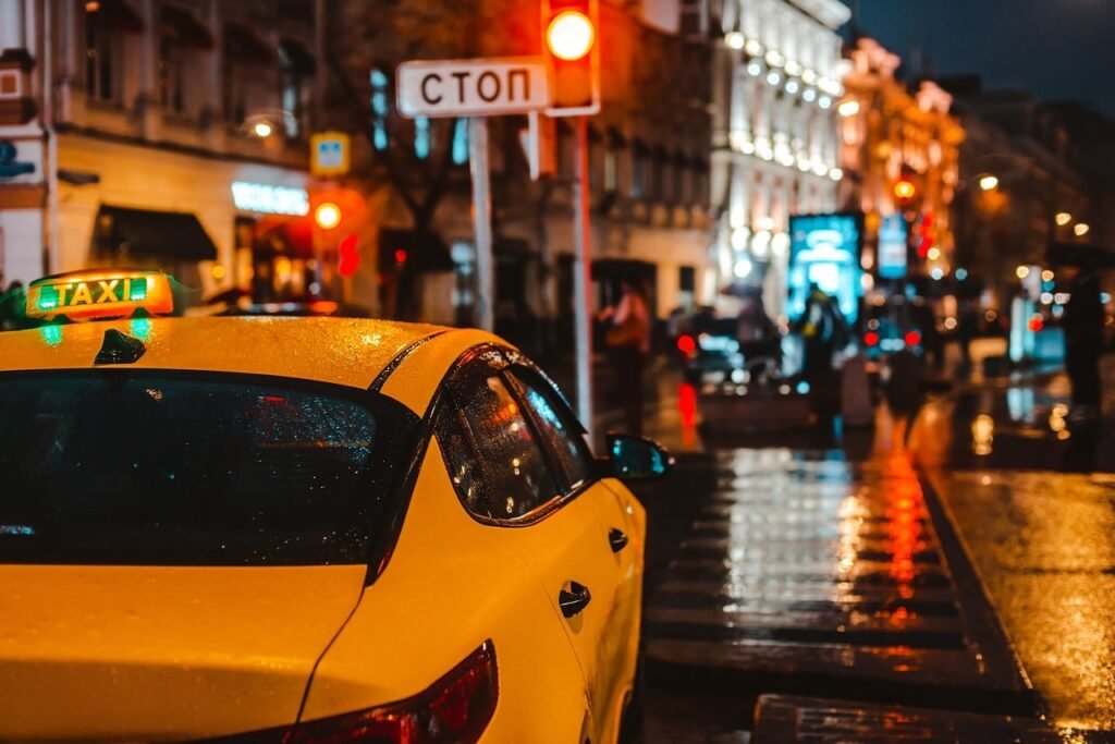 taxi, city at night, traffic signal, yellow, lighting, rainy, street, nighttime, vehicle, rainy evening, stop sign, square, r