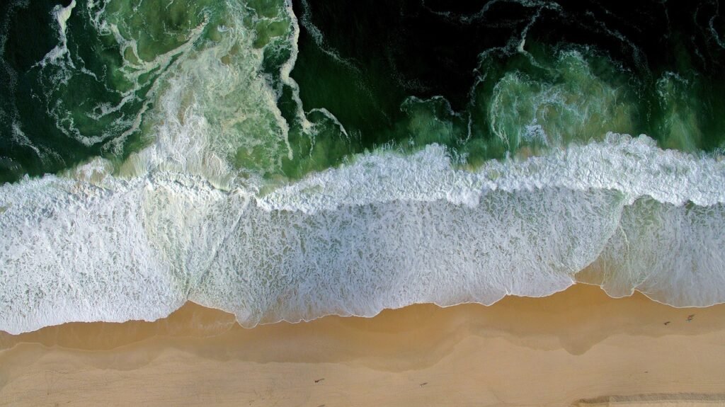 beach, sea, aerial view, waves, bird's eye view, ocean waves, spume, sand, sandy beach, shore, seashore, coast, coastline, na