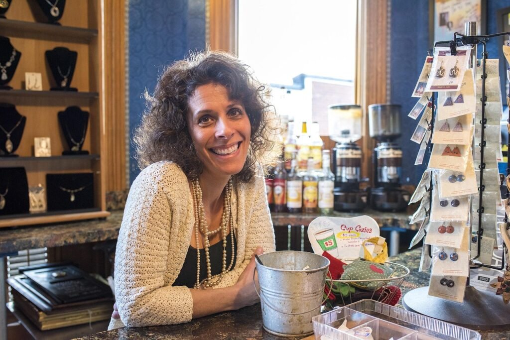 smiling woman, coffee shop, cafe, coffee, shop, caucasian, smiling, happy, female, woman, drink, people, indoors, adult, jewe